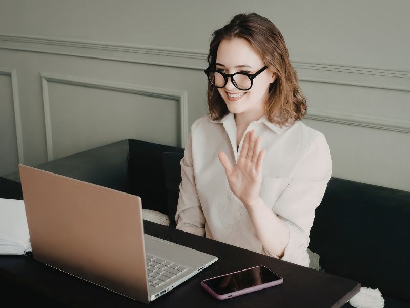 one on one coaching conversation laptop